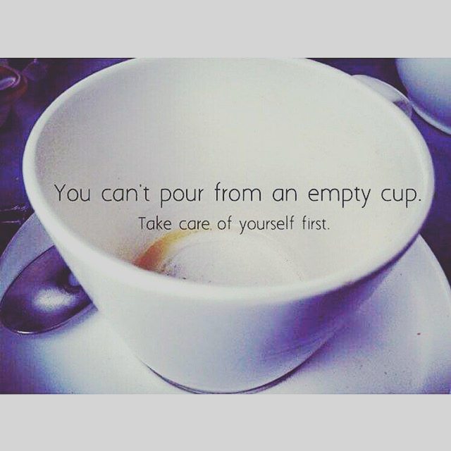 You can't pour from an empty cup, Take care of yourself first in black with an empty coffee mug in a wite plate with a spoon on it..